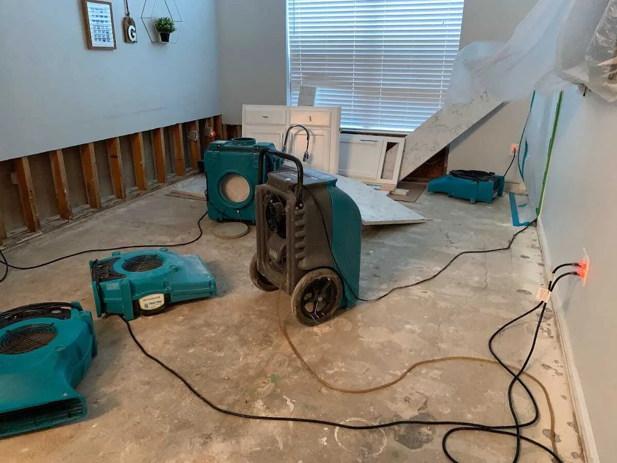 Dehumidifier in flood-cut room for Water Damage Restoration in Lamar